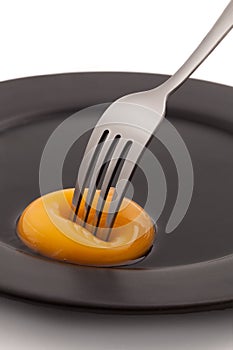 Egg yolk with fork pricking