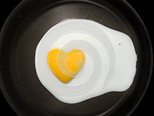 Egg yolk heart-shape