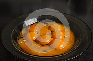Egg yolks in a plate on the table