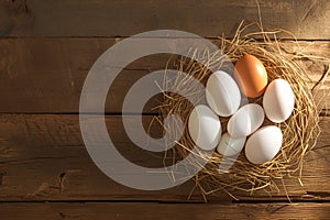 Eggcellent display Wooden background frames chicken eggs in rustic nest
