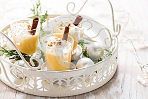 Eggnog with cinnamon and nutmeg for Christmas and winter holidays