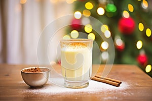 eggnog in a vintage glass, focus on froth