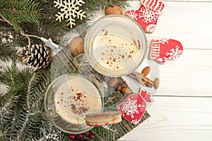 Eggnog, winter Christmas traditional hot drink with milk, eggs,