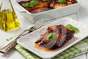 Eggplant casserole with parmesan, melanzane alla parmigiana, italian cuisine. photo