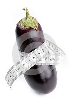 Eggplant with measuring tape photo