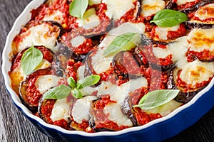 Eggplant parmigiana in a baking dish, top view