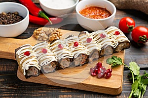 Eggplant rolls with cheese , nuts, herbs and pomegranate seeds. Dish of Georgian cuisine