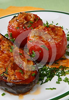 Eggplant and tomatoes filled with rice