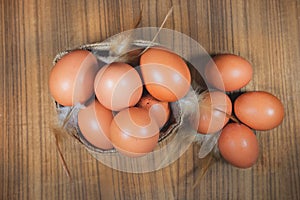 Eggs in basket on wood.eggs.egg.brown.rawfood