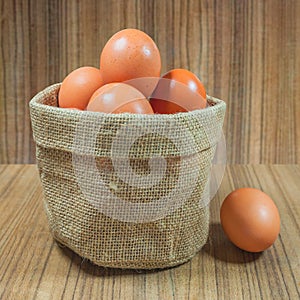 Eggs in basket on wood.eggs.egg.brown.rawfood