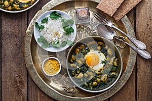 Eggs with bean, dill and rice. Iranian breakfast