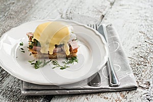 Eggs Benedict in the context of a hollandaise sauce
