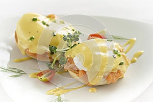 Eggs benedict royale breakfast with smoked salmon and hollandaise sauce