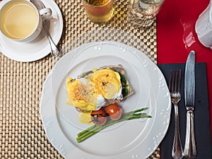 Eggs Benedict with vegetables