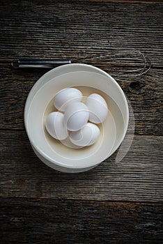Eggs in a Bowl with a Whisk