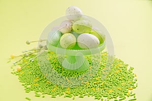 Eggs on cake stand with sprinkles