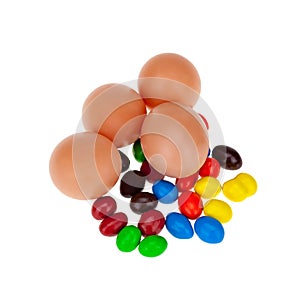 Eggs with candy isolated white background.