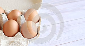 Open egg packaging, close-up. Fresh protein food