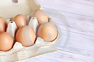 Open egg packaging, close-up. Fresh protein food