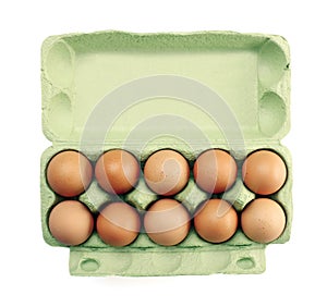 Eggs in a carton isolated on white