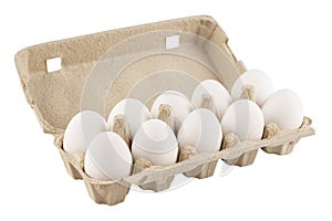 Eggs in an egg carton on a white background. Isolated