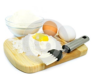 Eggs and flour ingredients for dough preparation