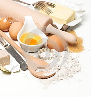 Eggs, flour, sugar, butter, yeast. dough preparation