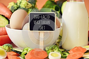 Eggs, milk, vegetables and text ovo-lacto vegetarian diet