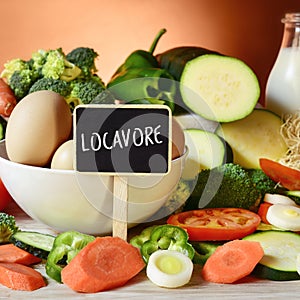 Eggs, milk, vegetables and word locavore