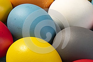 eggs painted in different colors to symbolize the passage of Christian Easter.