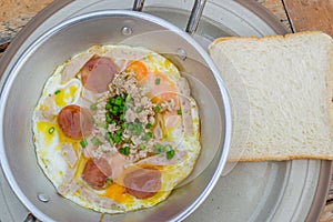 Eggs on pan for breakfast thailand style