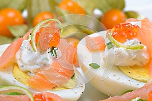 Eggs with salmon and caviar