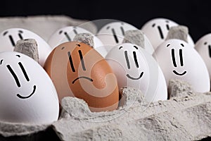 Eggs with smiley faces in eggshell