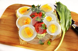 Eggs and tomatoes on bread