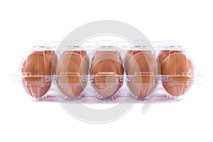 Eggs in transparency plastic package on white background