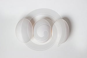 Eggs on a white background. White chicken eggs