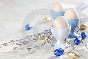 Eggs in white and blue eggcups
