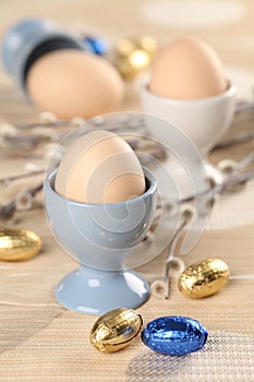 Eggs in white and blue eggcups