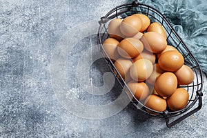 Eggs in wire basket with copy space