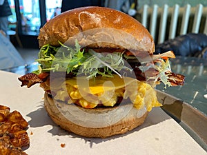 Eggslut Burger with Bacon and Corn Fritters