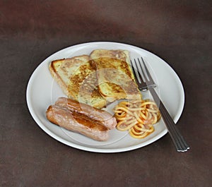 Eggy Bread, spaghetti and sausage breakfast meal