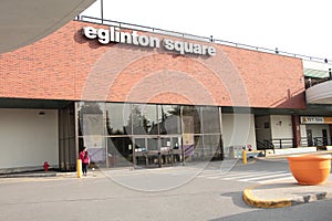 tor, canada - august 8, 2023: eglinton square shopping centre mall sign writing caption text on mall brick. p
