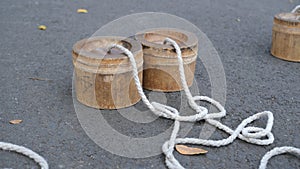 Egrang shell is a game of stilts that use coconut shells or bamboo as a foohold. photo