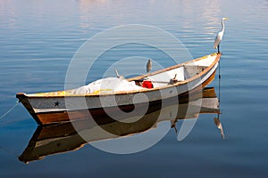Egret on a fishing boat