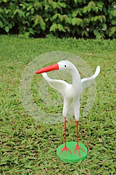 egret model standing on turf