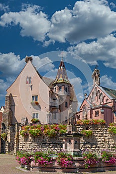 Eguisheim fountain and church