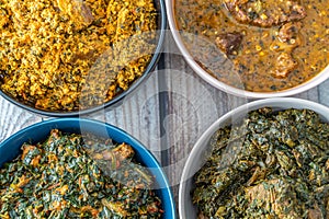 Egusi Ogbonno, Vegetable and Afang soup with pounded yam and Eba Garri