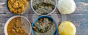 Egusi Ogbonno, Vegetable and Afang soup with pounded yam and Eba Garri