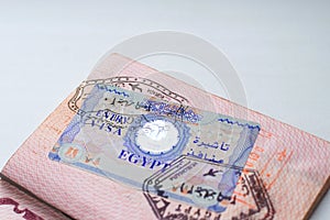 Egypt entry visa sticker on page in russian passport