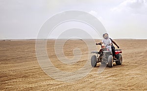 Egypt, Hurghada, January 2019 - quad safari through the desert of Egypt. Speed and movement.